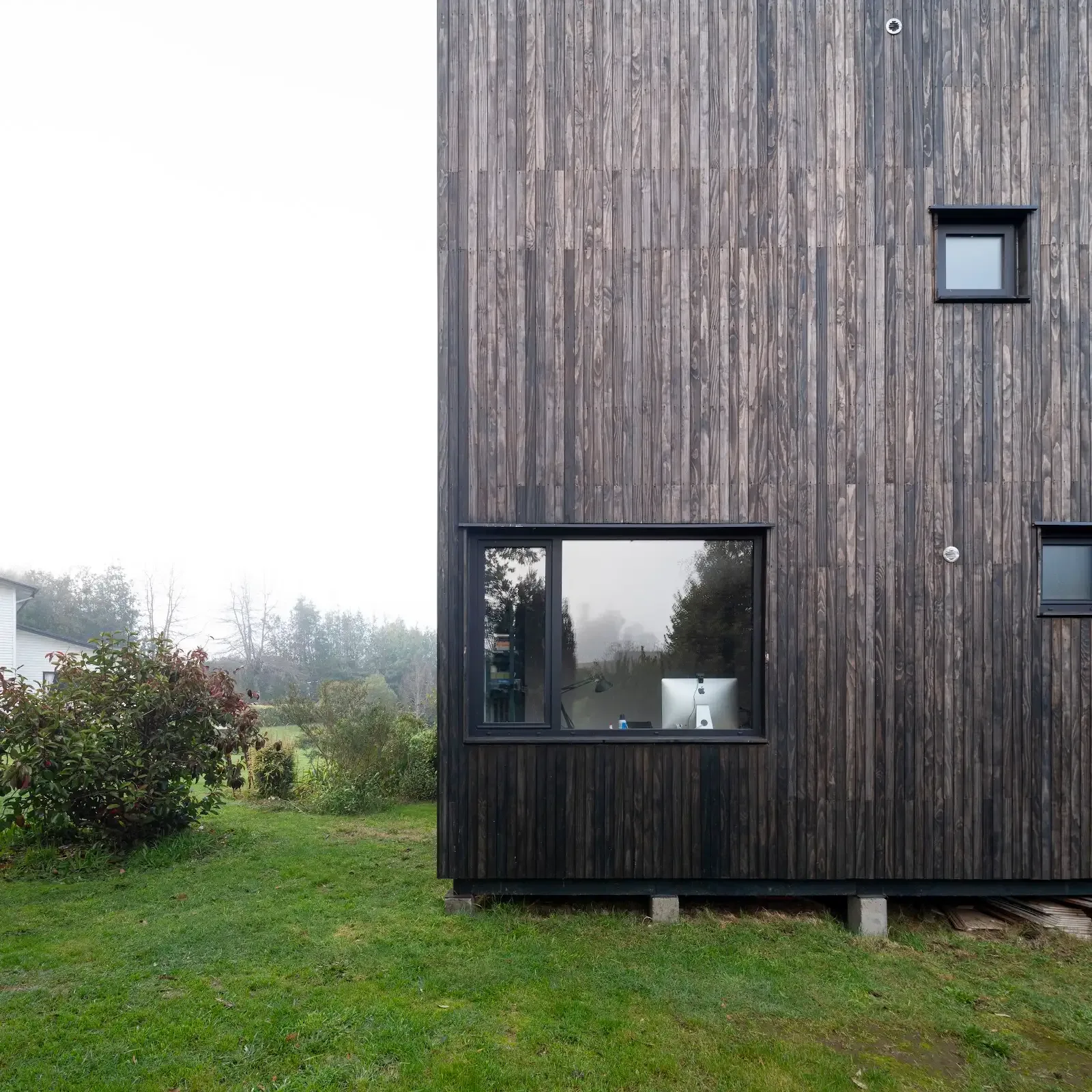 Casa Las Ánimas en Valdivia con revestimiento TW-02A de Topwood